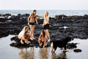 Family tidepooling at Poipu beach