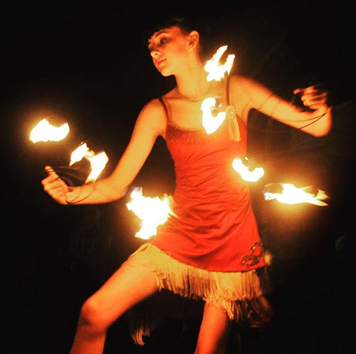 Fire dancer at Kilauea art night Kauai